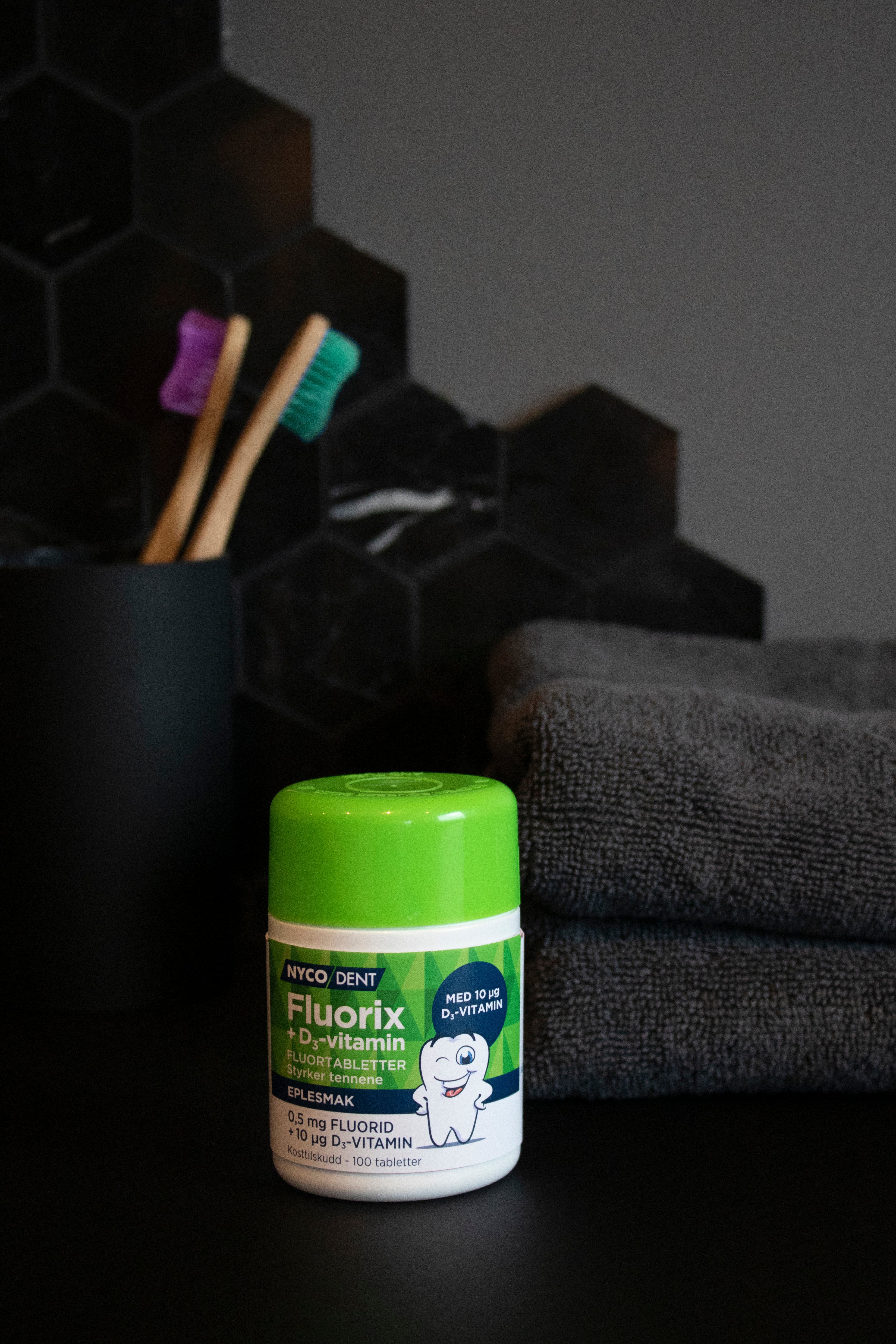 Nycodent Fluorix 0,5 mg + D-vitamin eple, 100 stk.